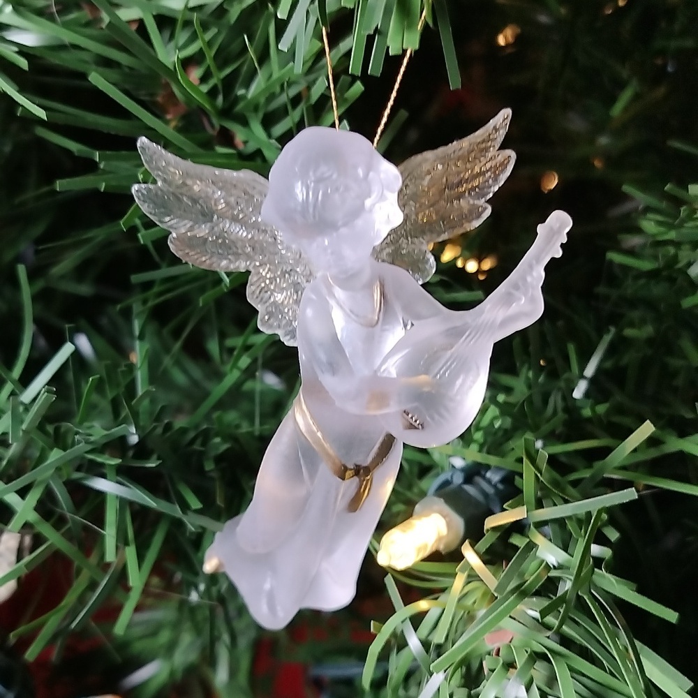 Angel Christmas Ornament playing instrument